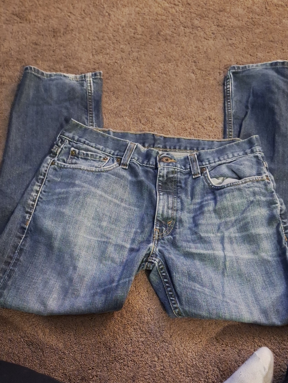 Levi's blue denim jeans with leather logo patch